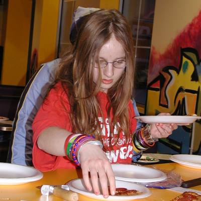 Cynthia gets ready to test three different kinds of pizza. Cynthia gets ready to test three different kinds of pizza.